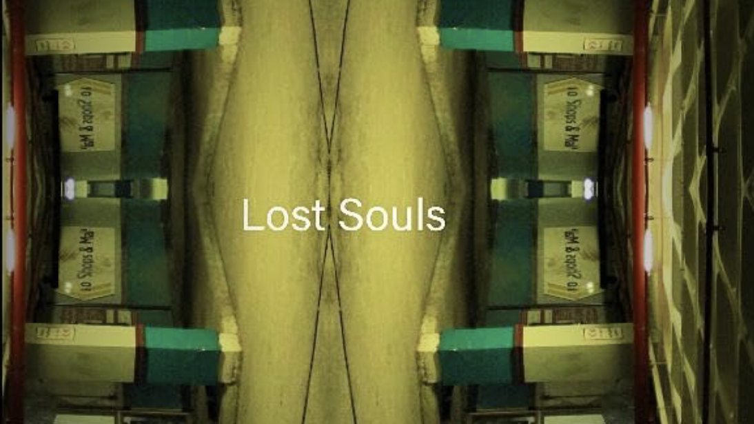 A mirrored, symmetrical shot of an underground station with the Lost Souls title